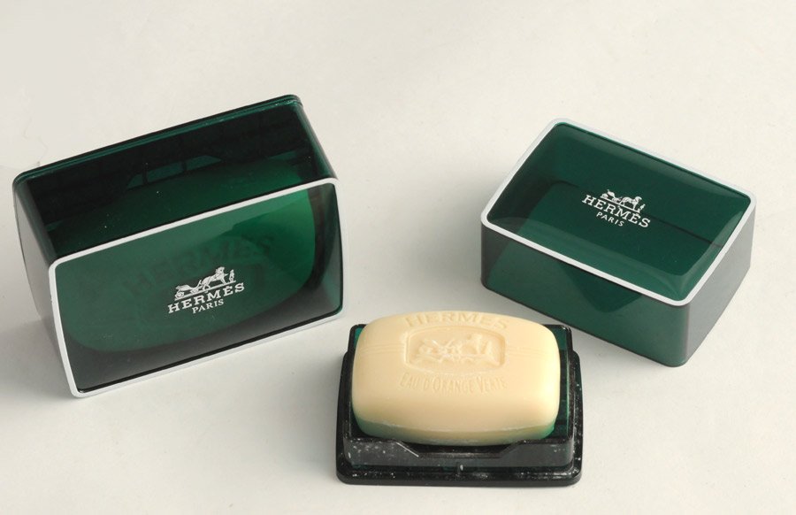 HERMÈS PARIS: Two ''eau de cologne'' et ''eau d'orange verte'' soaps for l'Hôtel de Paris, in their green and white case.