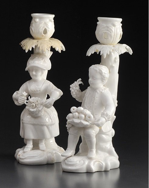 DERBY, 18TH CENTURY: DERBY Two white porcelain figurines representing of lowers shaped as candlesticks. Label of the “Association the British antique dealers ». Blue mark. England, 18th century. From an important Can