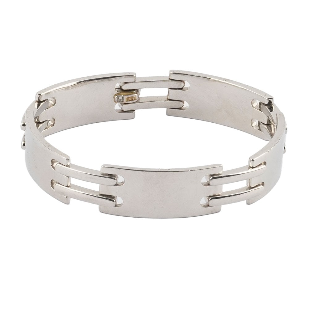 PLATINE: Description française: PLATINE Bracelet articulé en platine ( testé 90.18%) Poids brut: 148.8 g Longueur: 22.5 cm - 8.75" English Description: PLATINUM Articulated platinum bracelet
