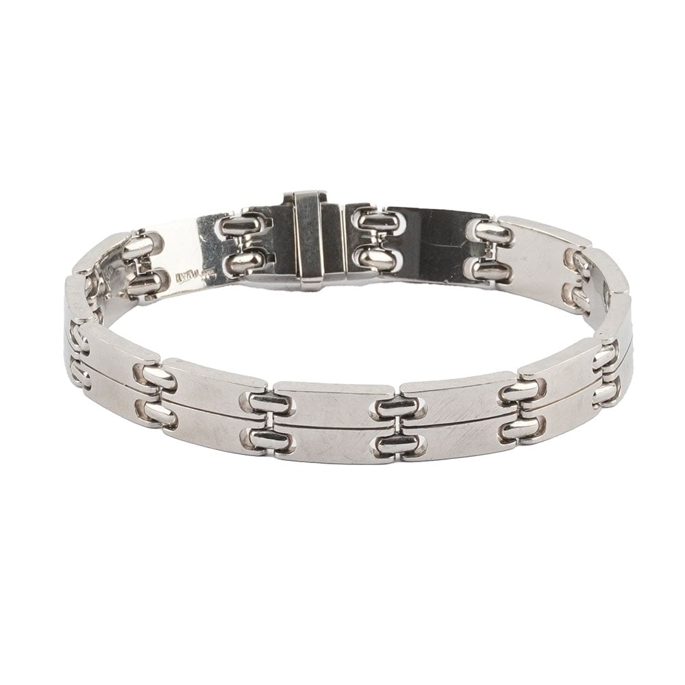 PLATINE: Description française: PLATINE Bracelet articulé en platine ( testé 90.27%) Poids brut: 98.7 g Longueur: 22.5 cm - 8.75 English Description: PLATINUM Articulated platinum bracelet
