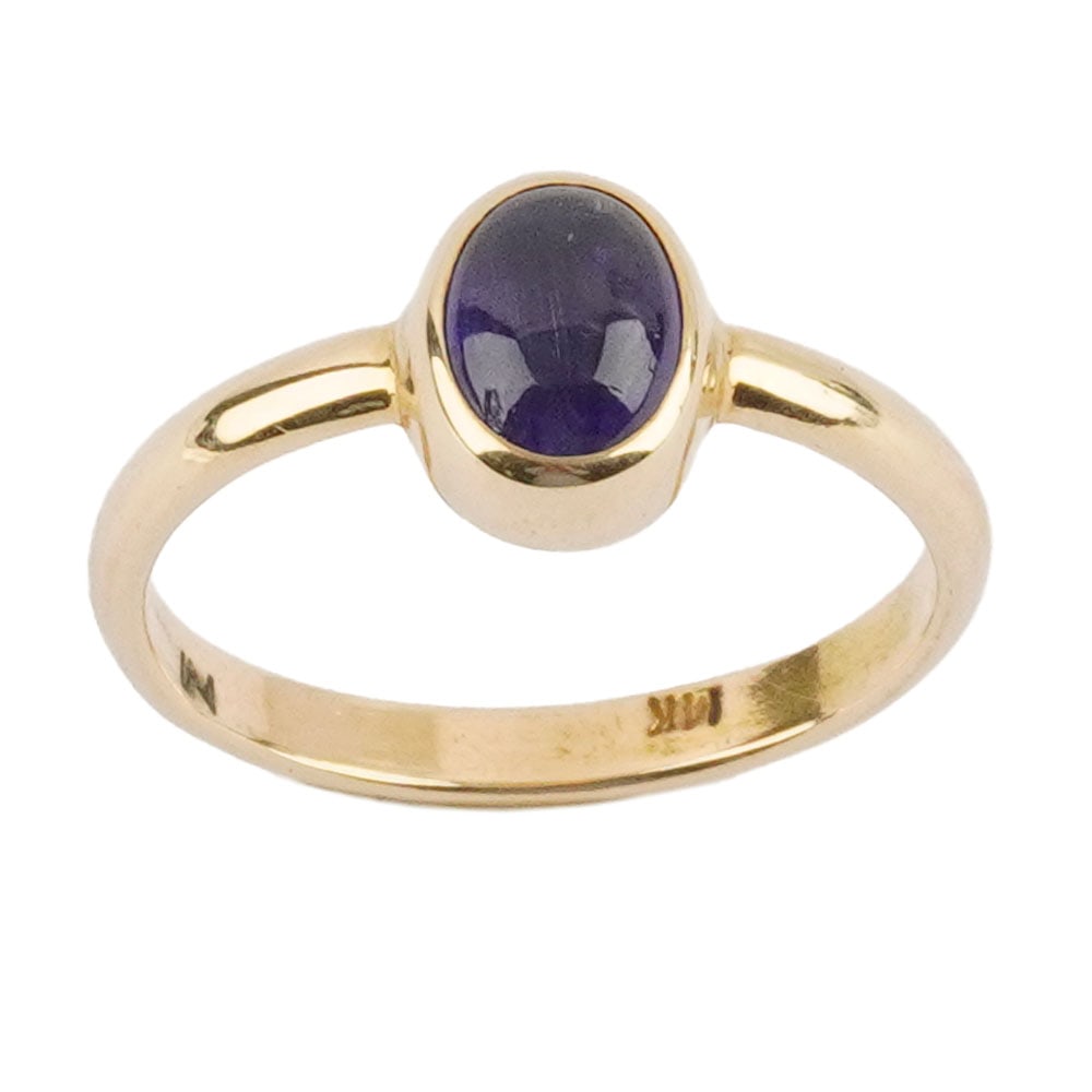 OR 14K ,TANZANITE / 14K GOLD, TANZANITE: Description française: OR 14K ,TANZANITE / 14K GOLD, TANZANITE Bague en or jaune 14K sertie d'un cahochon ovale de tanzanite pesant approximativement 2.9 ct. Poids brut: 3.1 g Taille: 8.25 US Eng
