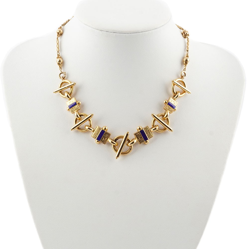 OR 18K / 18K GOLD: Description française: OR 18K / 18K GOLD Collier ajouré et articulé en or 18K serti de pierres bleues. Poids brut: 22.4 g Longueur: 39.5 cm - 15.5" English Description: 18K GOLD