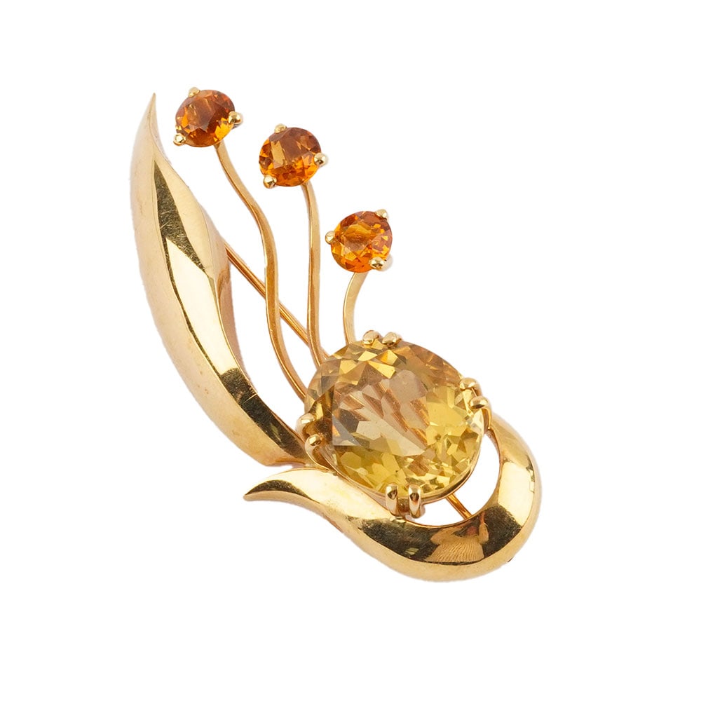 DELRUE, Georges (1920-2010): Description française: DELRUE, Georges (1920-2010) Broche ajourée en or jaune 18K sertie d'une citrine de 17.6 x 14.3 x 10.1 mm et 3 pierres Signée: "Delrue", "18K" Poids brut: 20.1 g D