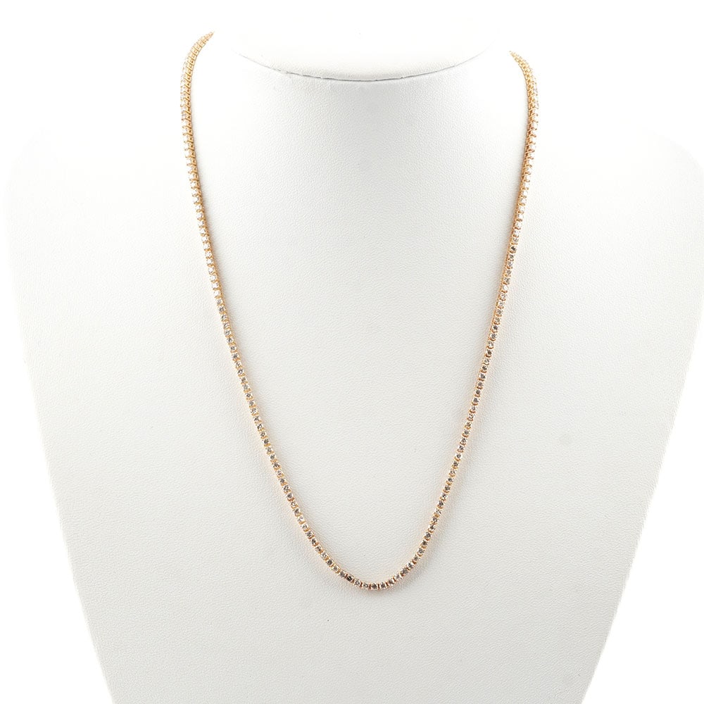 OR 14K, DIAMANTS / 14K GOLD, DIAMONDS: Description française: OR 14K, DIAMANTS / 14K GOLD, DIAMONDS Collier rivière en or jaune 14K serti de diamant pesant approximativement 7.0 ct au total, pureté: SI, couleur: H -I Poids b