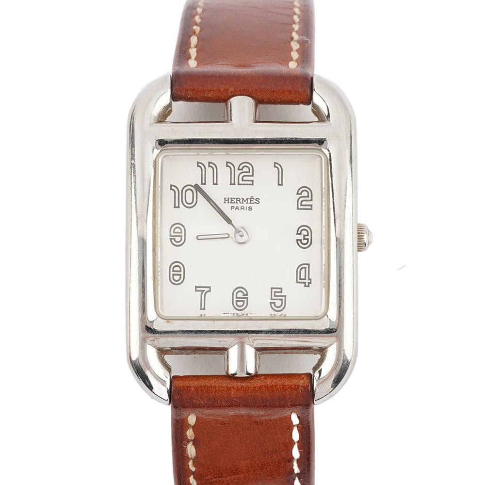 HERMÈS: Description française: HERMÈS Montre Hermès CC1.210 en acier, boîtier "H" de 42 x 23 mm, cadran argenté, chiffres arabes appliqués pour les heures, bracelet en cuir