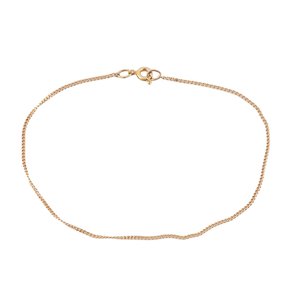 OR 10K / 10K GOLD: Description française: OR 10K / 10K GOLD Bracelet en or jaune 10K à maille gourmette. Poids brut: 1.0 g Longueur: 20 cm - 8" English Description: 10K GOLD 10K yellow gold bracelet with curb