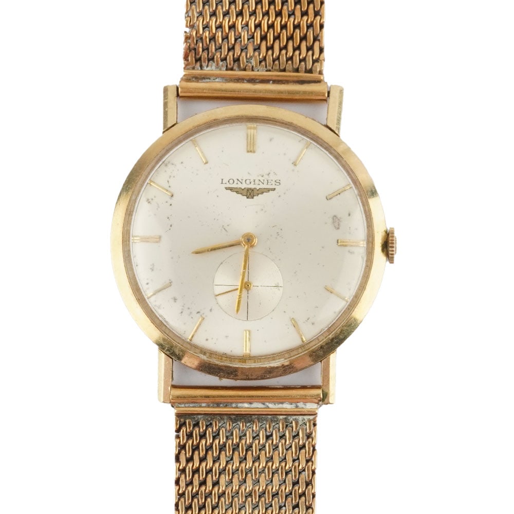 LONGINES: Description française: LONGINES Montre-bracelet Longines en or 14K, boîtier de 32mm, cadran argenté, index bâtons appliqués pour les heures, seconde à 6h, mouvement