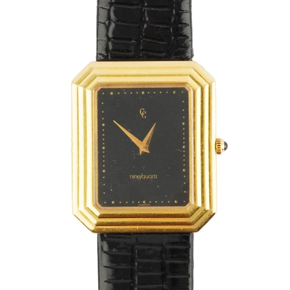CONCORD: Description française: CONCORD Montre Concord, boîtier en or 18K de 32 x 27 mm, cadran noir, mouvement quartz, bracelet en cuir noir. Réf: 5081621 English Description: CONCORD Concord