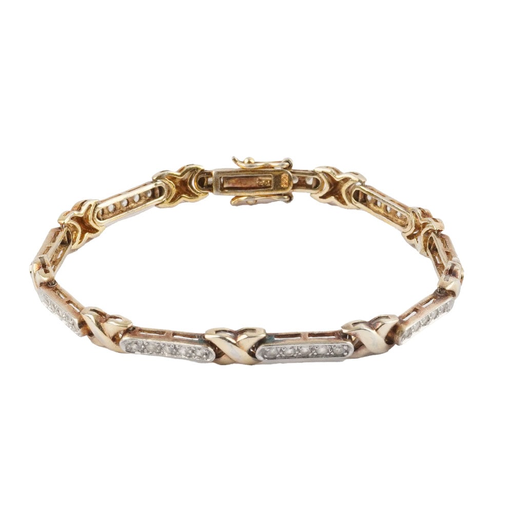 ARGENT / SILVER: Description française: ARGENT / SILVER Bracelet en argent plaqué or serti de pierres brillantes. Poids brut: 12.0 g Longueur: 19 cm -7.5" English Description: SILVER Gold-plated silver