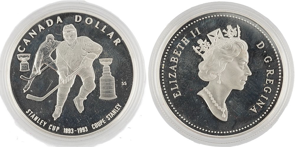1$ CANADA - STANLEY: Description française: 1$ CANADA - STANLEY CUP 1993 Une pièces de 1$ de 1993 commémorant 100ème anniversaire de la coupe Stanley, argent 0.925, poids 25.17 g Boîte d'origine