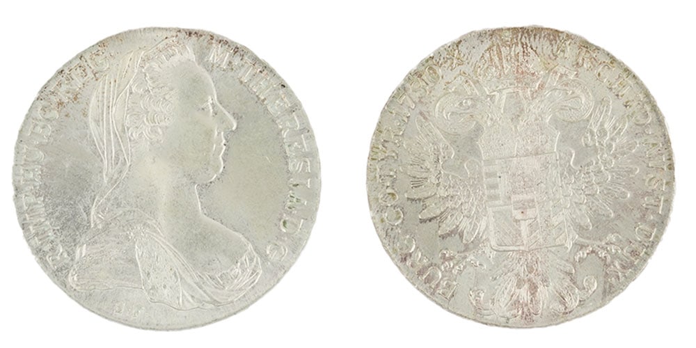 MARIE-THÉRÈSE 1780: Description française: MARIE-THÉRÈSE 1780 Deux pièces d'un Thaler de Marie-Thérèse de 1870, argent 0.833 Poids brut: 28.0 g Diamètre: 4.0 cm - 1.7" English