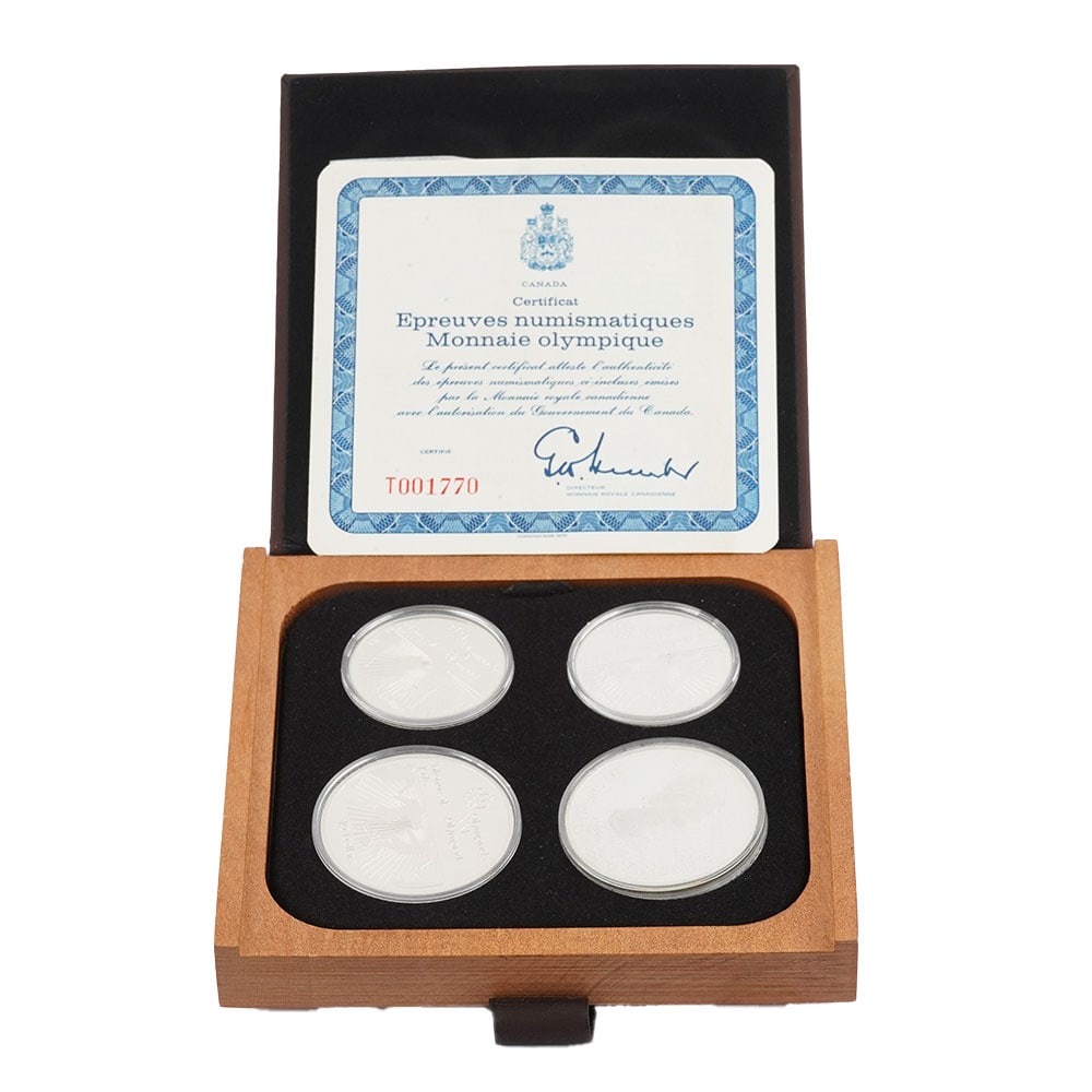 MONNAIES OLYMPIQUES / SILVER 0.925: Description française: MONNAIES OLYMPIQUES / SILVER 0.925 Coffret de quatre pièces de monnaie olympique 1976 du Canada 1976, deux de 5$, poids de 24.3 g chaque et deux de 10$, poids 48.60