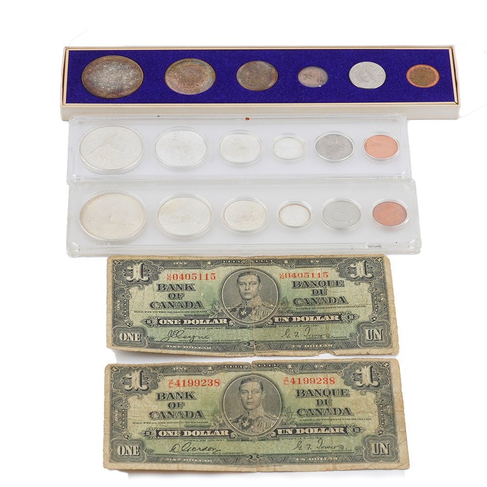 CANADA: Description française: CANADA Lot de pièces de monnaies du Canada comprenant: - deux ensembles de 6 pièces de monnaies du Canada 1867-1967 comprenant 1 dollar, 50 cents, 25 cents et 10 