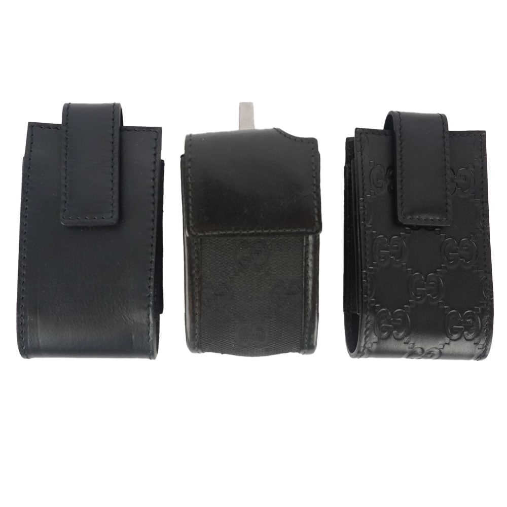 GUCCI: Description française: GUCCI Lot comprenant 3 étuis à téléphone. English Description: GUCCI Set including 3 phone cases.