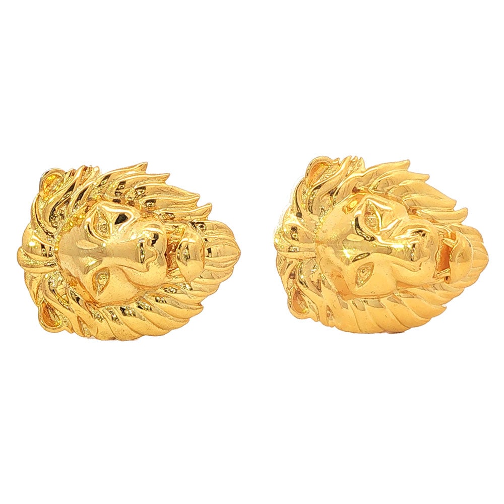 BOUTONS DE MANCHETTE/ CUFFLINKS: Description française: BOUTONS DE MANCHETTE Boutons de manchette en métal doré représentant un lion. English Description: CUFFLINKS Gold-tone cufflinks representing a lion.