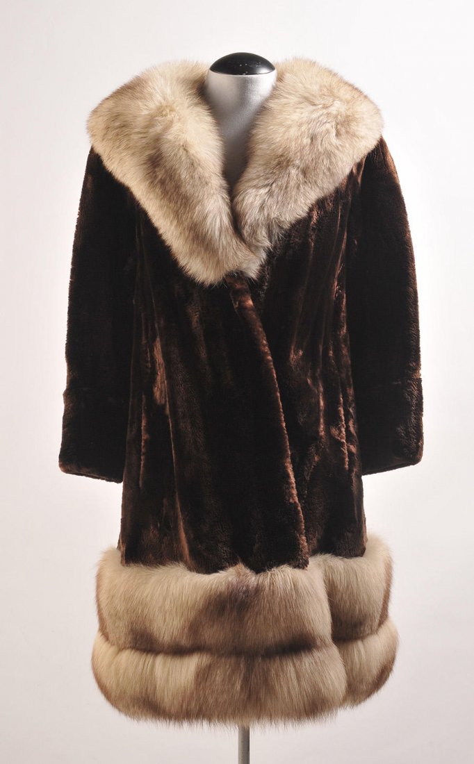 CHRISTIAN DIOR: Mid length sheared mink fur coat, silver fox large collar and bottom, one pocket on each side. Small size.
