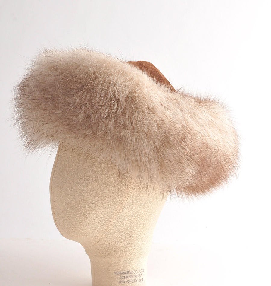 FOX: Felt and fox fur coat.