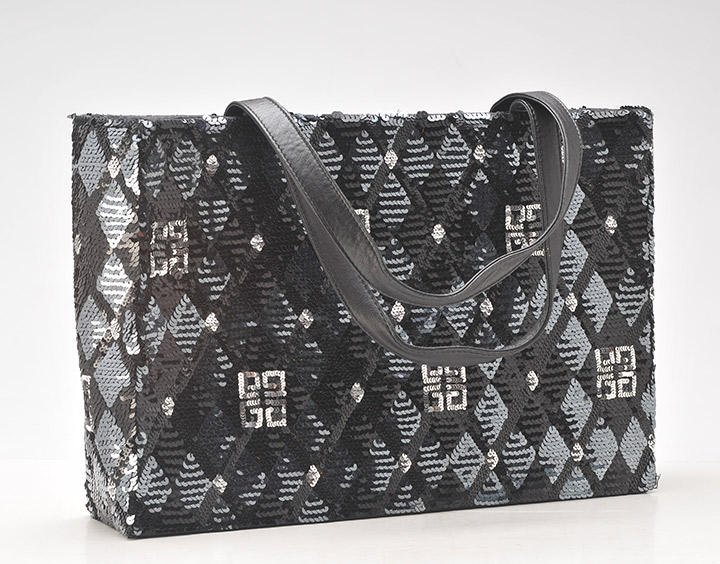 GIVENCHY: Silver and black canvas and sequins handbag, double leather handles, inside zipped pocket. L: 36cm - 14’’