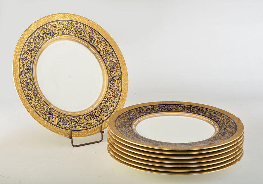 PORCELAIN BALL, Henry Morgan & Co, Montréal: Set of eight porcelain plates with a gilt and blue marine décor. Inscription on the bottom : PORCELAIN BALL, Mintons, Henry Morgan & Co, Montréal, B 4929.D : 27cm - 10.5''