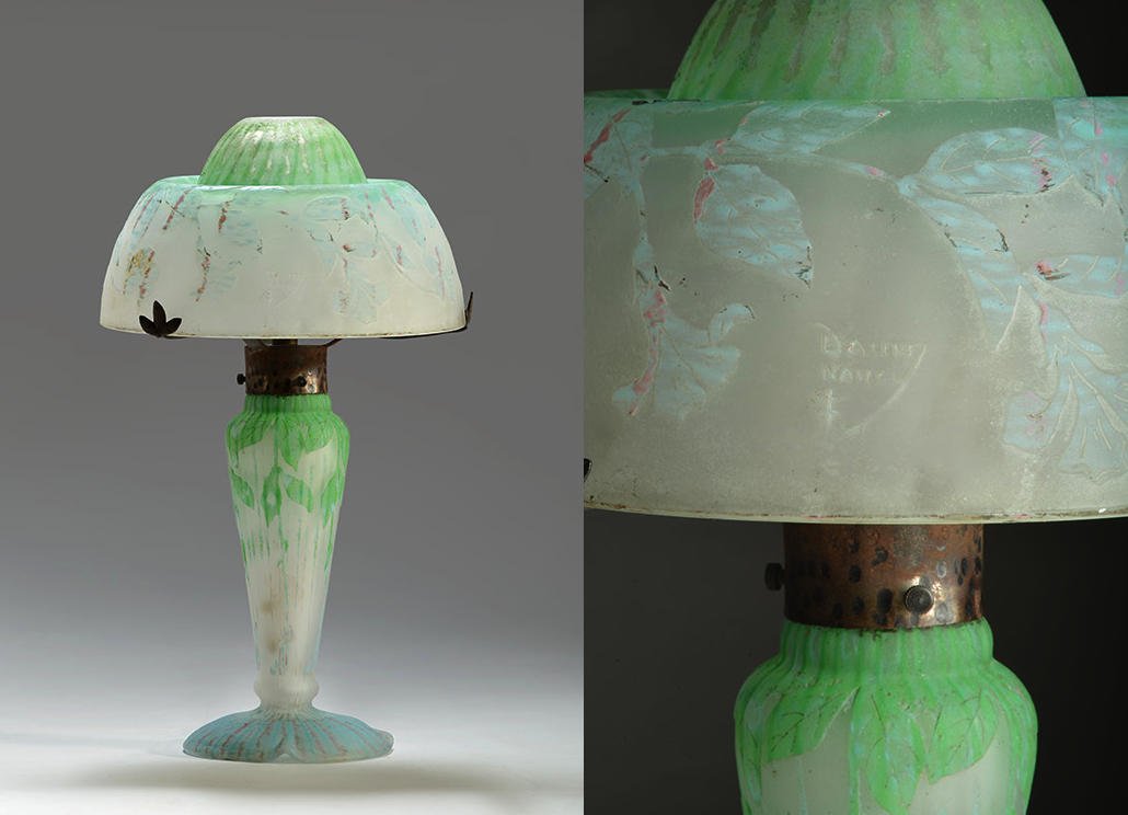 DAUM NANCY: Mushroom baluster LAMP, multilayer glass paste with a light blue, light green and pink foliage decor. A circular base. Forged wrought iron with three branches. Signed on the shade: Daum Nancy. France.