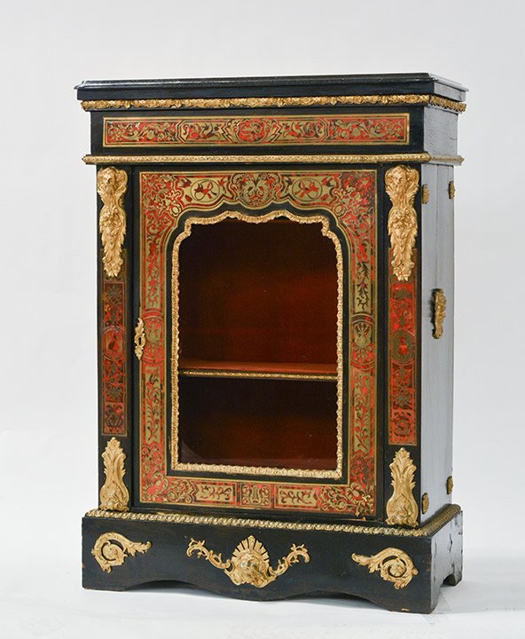 In the taste of André Charles Boule: Louis XIV style buffet in the taste of André Charles Boule, decorated with rich bronze ornements, brass and turtleshell marquetry. H: 147cm - 57.8'' L: 61cm - 24'' l: 36cm - 14''