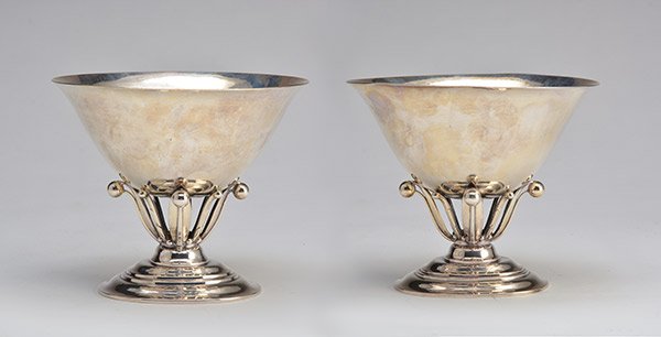 Silversmith Georg Jensen(1866-1935): Pair of sterling silver cup resting on a foliage pedestal. Mark on the bottom from master silversmith Georg Jensen and designer Johan Rohde. Denmark 1925-1932 H: 13.5cm - 5.5" D: 16cm - 6.5" Weight: 8