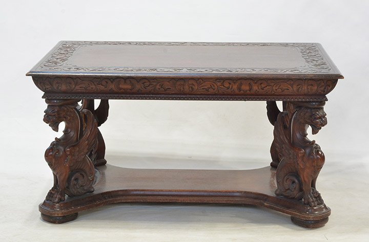VICTORIAN: Victorian sculpted wood table, tray strut and sculpted winged lions. The tray with volute sculpted on the outline ornated with gadroon frieze.Ê H : 72cm - 28.5" L : 138cm - 54.5" l : 94cm - 37"