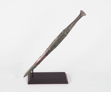 IRON AGE - 1000 - 800 B.C: IRON AGE - 1000 - 800 B.C Large Iron Age Bronze Dagger Of elegant form with tapering double-edged blade, the flanged hilt once decorated with bone or wood inserts.