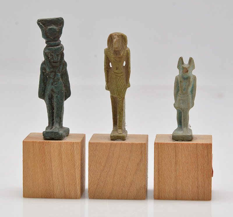 Three faience amulets - Late period, circa 664-332 B.C.: Group of Three faience amulets, comprising of Thoth, Anubis, and Isis.Late period, circa 664-332 B.C.3.8cm - 1"Provenance : Estate of the architect Paul-Henri Lapointe, died about 1980. Private collec
