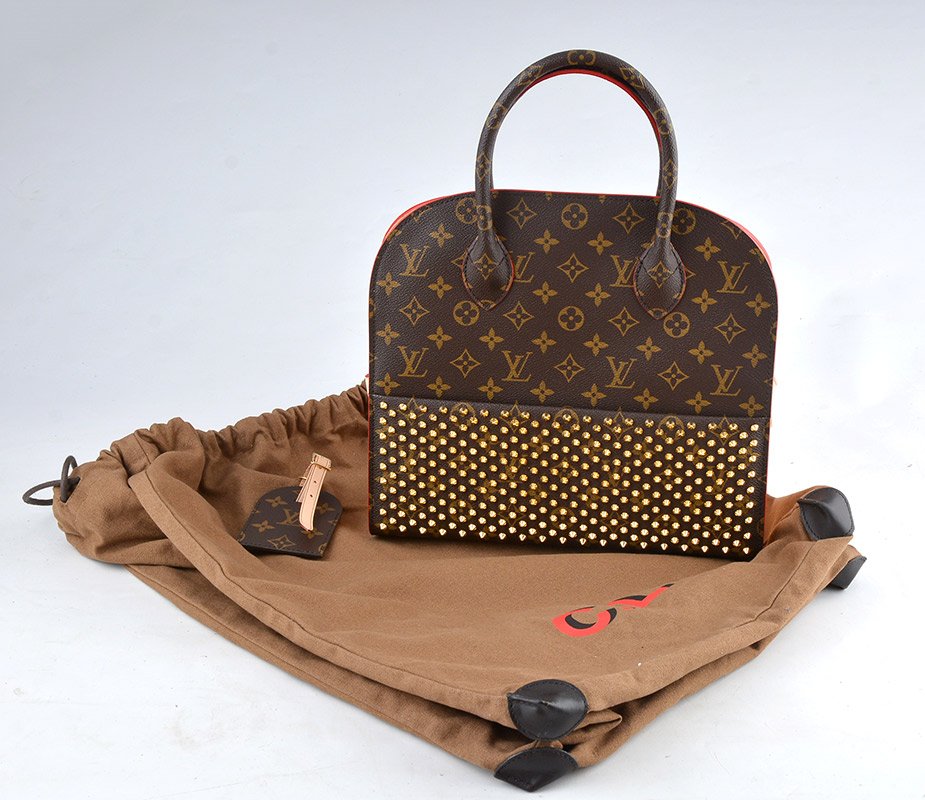 LOUIS VUITTON - CHRISTIAN LOUBOUTIN: LOUIS VUITTON - CHRISTIAN LOUBOUTIN Shopping bag made of Monogram leather on the front panel, decorated with gilt metal nails above the front pocket; red calf leather on the rear panel; leather handle