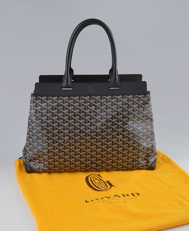 GOYARD - PARIS: GOYARD - PARIS Goyardine canvas and black leather bag, double handle, inside pocket. Goyard monogram at the centre front, close to the handles. With its dust bag. H: 48cm - 19" L: 44cm - 17.25"