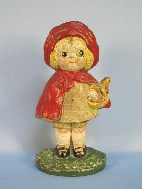 Vintage Cast Iron Little Red Riding Hood Door Stop: Vintage Cast Iron Little Red Riding Hood/Girl Door Stop. Doorstop Measures 9 1/2" high. Shows some paint loss