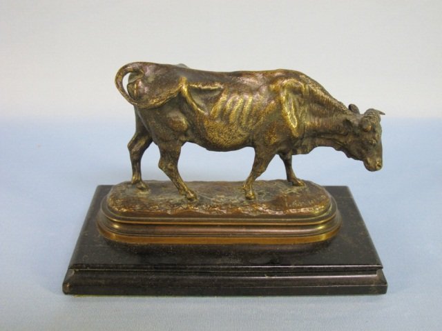 ISIDORE BONHEUR (French, 1827-1901) STANDING COW: ISIDORE JULES BONHEUR (French, 1827-1901), STANDING COW, bronze, signed I. Bonheur on marble base. Bronze measurements without the base: 3 1/4" High by 5 1/2" wide. Condition: marble base has small ch