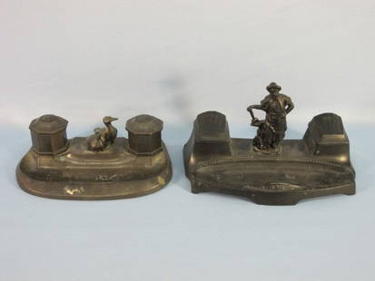 Two Vintage Cast Iron Inkwells: Two Vintage Cast Iron Ink wells; One is possibly Russian, middle 1950's 9 1/2"L x 4 3/4"D , the other with two ducks on top is possibly German 8 1/4"L4 5/8"D Both Inkwells show some were.