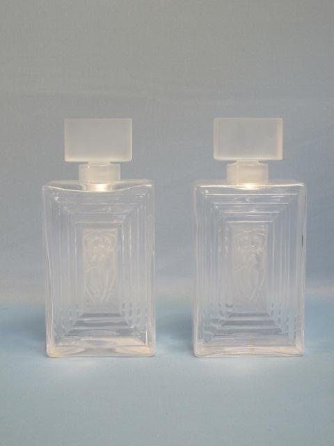 Pair Lalique Duncan No 3 Perfume Bottles: Pair Lalique Duncan No 3 Perfume Bottles Lalique crystal two perfume bottle in the Duncan pattern, no. 11381 rectangular design. Each measures 8 inches high x 3 5/8 inch wide x 2 1/8 inch depth. Signe