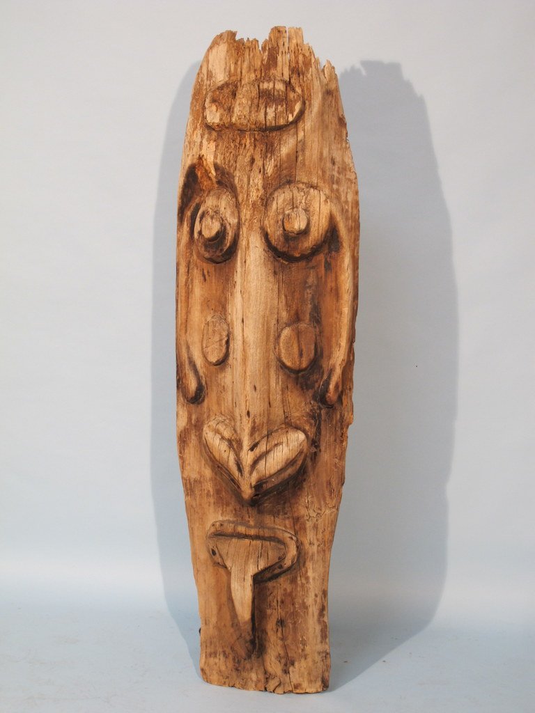 65in (165cm) Mask Wood Borneo, early 1900: Primitive, Mask, wood carving, possibly from Borneo, early 1900. 65 in H x 20 in W x 8 in D. Provenance: private collection from Mr John Wiegman, Houston,Texas.