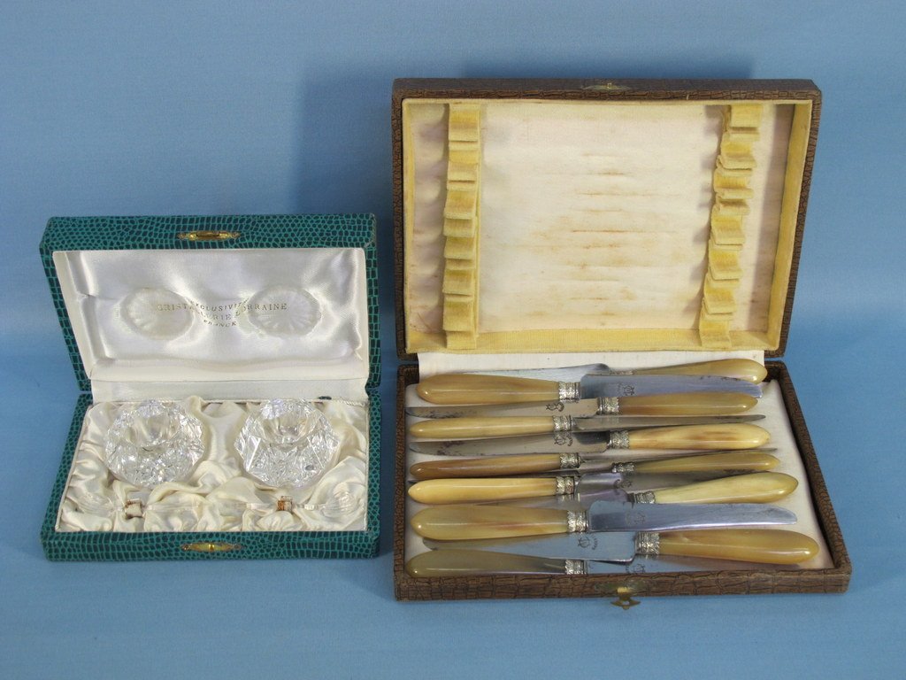 Cased Crystal French Salts & 12 Horn Handle Knives: Antique Pair Cased Crystal French Salts & 12 Horn Handle Knifes in a Original Case. The Salts are 2 1/4"D x 1 3/4"Ht with paper sticker Cristalerie Lorraine, comes with two salt spoons (one spoon has 