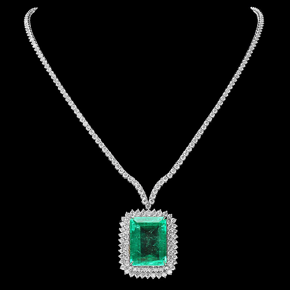 18k Gold 32.5ct Emerald 11ct Diamond Necklace: This luxurious ladies necklace is crafted in solid 18k White Gold and features a 32.50 carat 100% Natural Emerald mined from Colombia + accented with 250 sparkling eye-clean natural diamonds, totaling