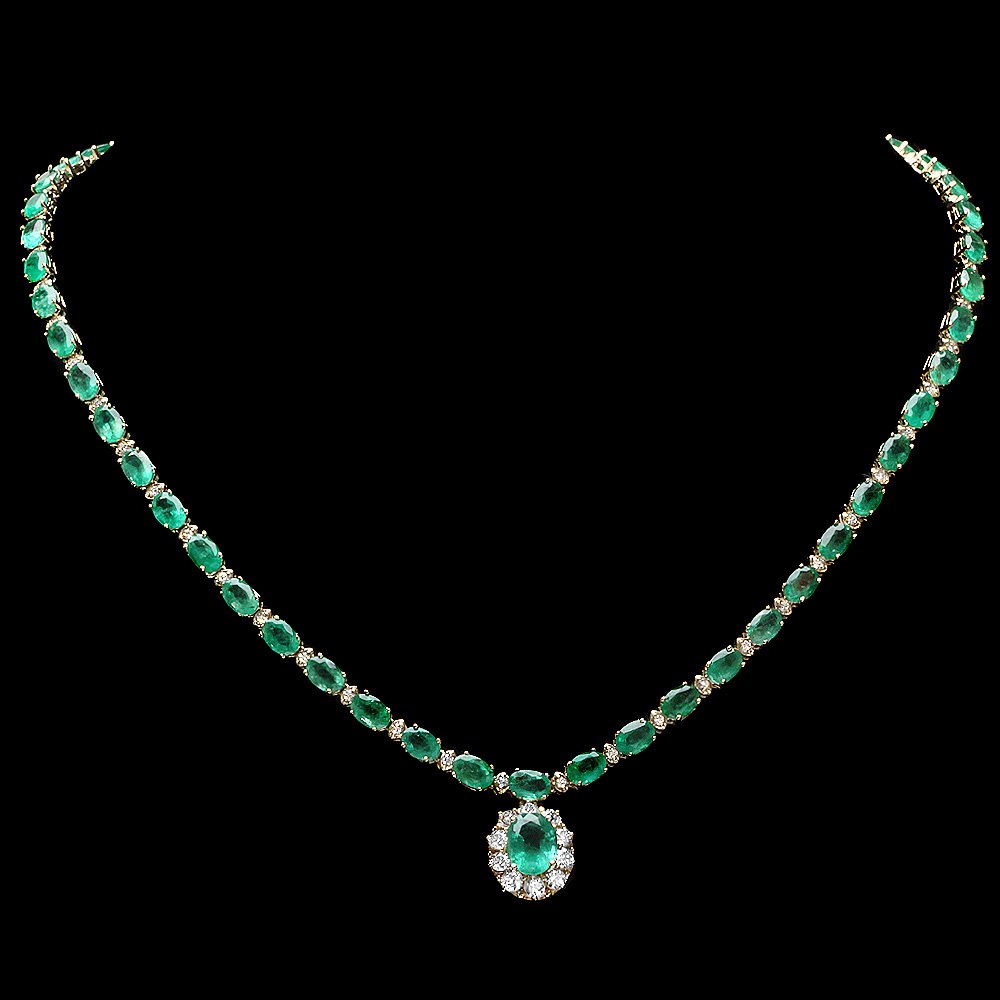 14k Gold 24ct Emerald 2ct Diamond Necklace: This elegant ladies necklace is crafted in solid 14k Yellow Gold and features a 1.50 carat 100% Natural Emerald mined from Colombia + accented with 63 sparkling eye-clean natural diamonds, totaling 2.