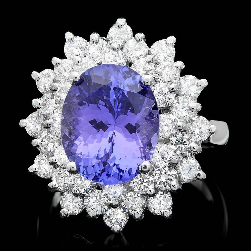 14k Gold 5ct Tanzanite 2.30ct Diamond Ring: This luxurious ladies ring is crafted in solid 14k White Gold and features a 5.00 carat 100% Natural Tanzanite mined from Tanzania + accented with 36 sparkling eye-clean natural diamonds, totaling 2.3
