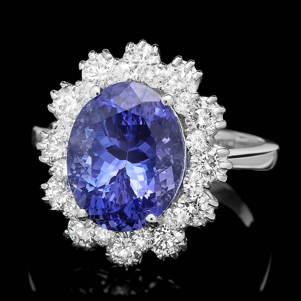 14k Gold 5ct Tanzanite 1.40ct Diamond Ring: This magnificent ladies ring is crafted in solid 14k White Gold and features a 5.00 carat 100% Natural Tanzanite mined from Tanzania + accented with 24 sparkling eye-clean natural diamonds, totaling 1