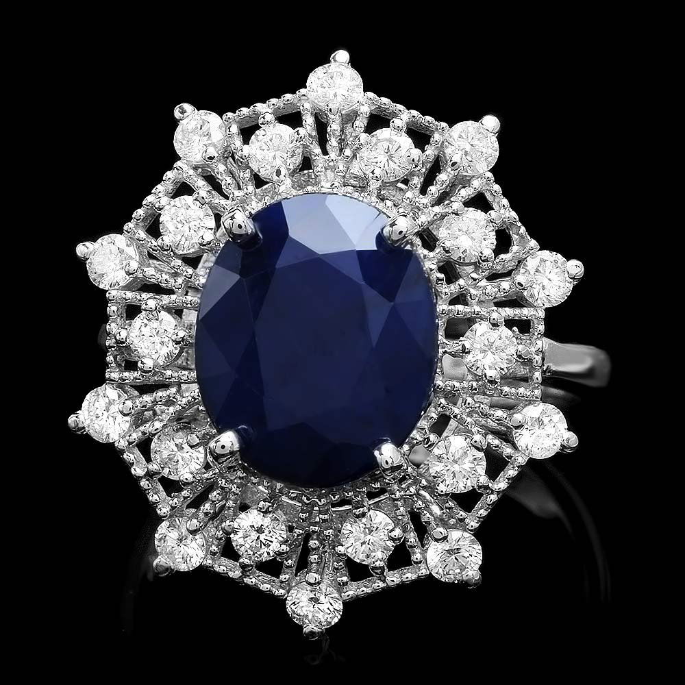 14k Gold 5ct Sapphire 0.80ct Diamond Ring: This luxurious ladies ring is crafted in solid 14k White Gold and features a 5.00 carat Natural Sapphire mined from Sri Lanka + accented with 20 sparkling eye-clean natural diamonds, totaling 0.80 car