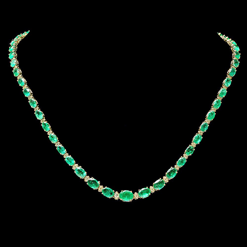 14k Gold 22ct Emerald 1.10ct Diamond Necklace: This magnificent ladies necklace is crafted in solid 14k Yellow Gold and features 51 (22.00 ctw) 100% Natural Emeralds mined from Colombia + accented with 51 sparkling eye-clean natural diamonds, tota