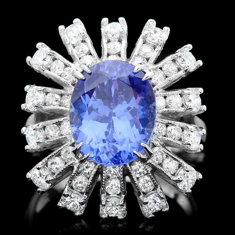 14k Gold 5ct Tanzanite 1.70ct Diamond Ring: This elegant ladies ring is crafted in solid 14k White Gold and features a 5.00 carat 100% Natural Tanzanite mined from Tanzania + accented with 42 sparkling eye-clean natural Diamonds, totaling 1.70