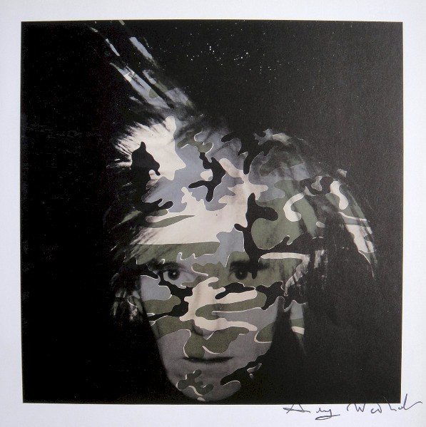 ANDY WARHOL, Signed Print, 1982: Andy WARHOL, "Camouflage Self-Portrait" signed Print. From a signed VIP book from 1982. Hand signed by Andy Warhol in black pen. Size: 8.3 x 8.3 in (21 x 21 cm) printed on the back.