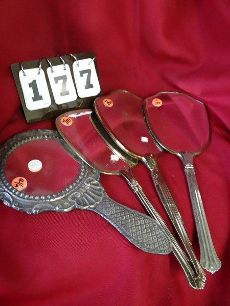 LOT OF 4 PIECES - HAND HELD MIRRORS - THREE SILVER TONE: LOT OF 4 PIECES - HAND HELD MIRRORS - THREE SILVER TONE - ONE CARVED WOOD - 11'' TO 14'' (ALL WITH SOME SCUFFS)