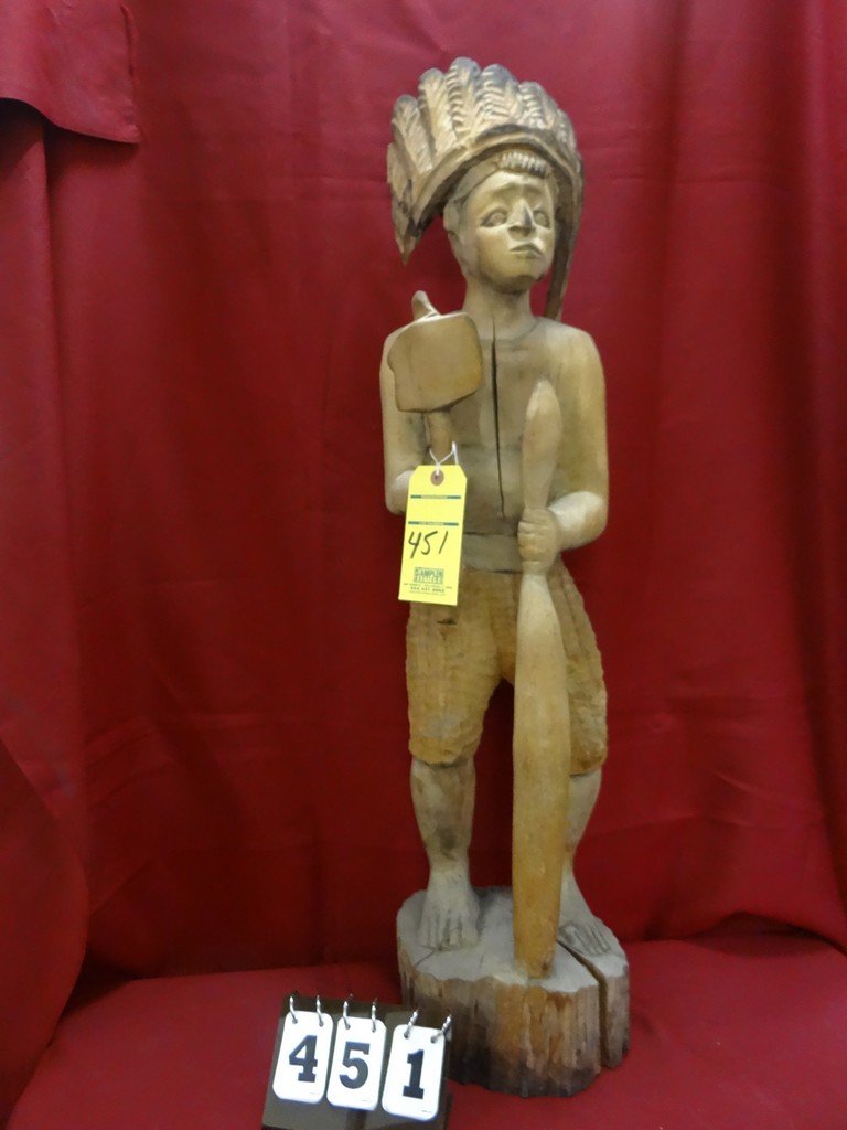 CARVED WOOD STATUE - MAN WITH HEADDRESS AND WEAPONS -: CARVED WOOD STATUE - MAN WITH HEADDRESS AND WEAPONS - 37'' TALL - (SOME CRACKS ON BASE, HEADDRESS AND CHEST)