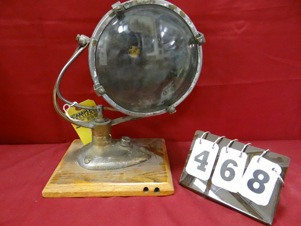 SHIP'S SPOTLIGHT - 200 WATT - CARLISLE AND FINCH: SHIP'S SPOTLIGHT - 200 WATT - CARLISLE AND FINCH COMPANY - MODEL 7SB3263X - ON WOOD STAND - (SOME DENTS ON BACK)- OVERALL 13'' TALL (NO ELECTRICAL COMPONENTS)