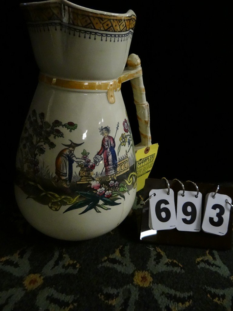 CERAMIC VASE - FLORAL DESIGN - E.M. AND C. BY CHANG(ON: CERAMIC VASE - FLORAL DESIGN - E.M. AND C. BY CHANG(ON BOTTOM) - 13'' TALL(HANDLE HAS BEEN REPAIRED)