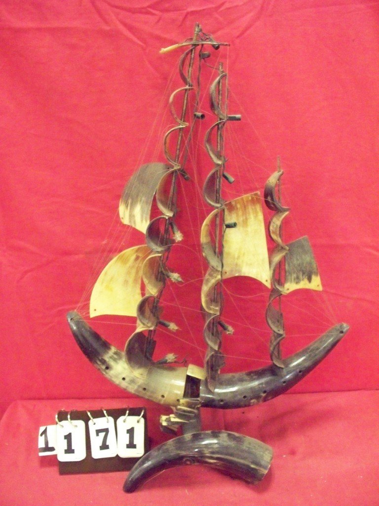 MODEL SHIP - MADE OF HORN - 18''LONG(26''TALL) (CRACK: MODEL SHIP - MADE OF HORN - 18''LONG(26''TALL) (CRACK ON BOTTOM, NEEDS TO BE RESTRUNG)